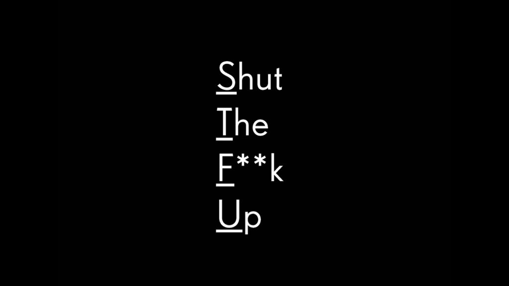 White text on black background reading "Shut The F**k Up"