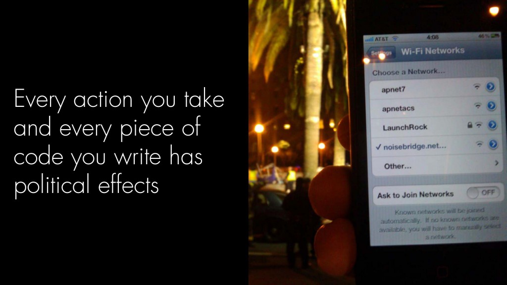 A list of available wireless networks on an iPhone screen; captioned "Every action you take and every piece of code you write has political effects"