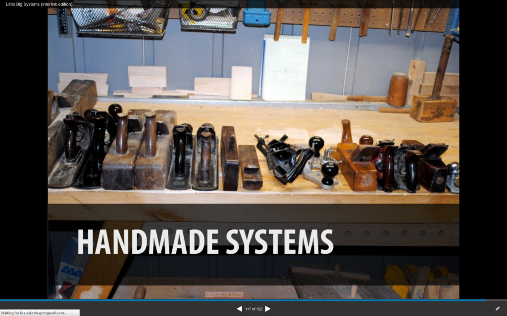 A shelf holding many woodworking tools, captioned "handmade systems."