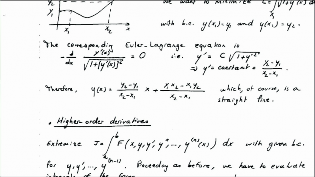 Closeup view of a page covered with complicated equations