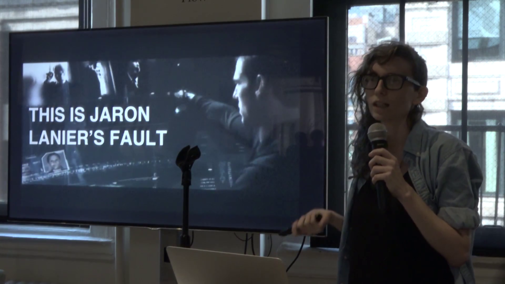 Still from Minority Report showing Tom Cruise using a heads-up interface, captioned "This is Jaron Lanier's fault"