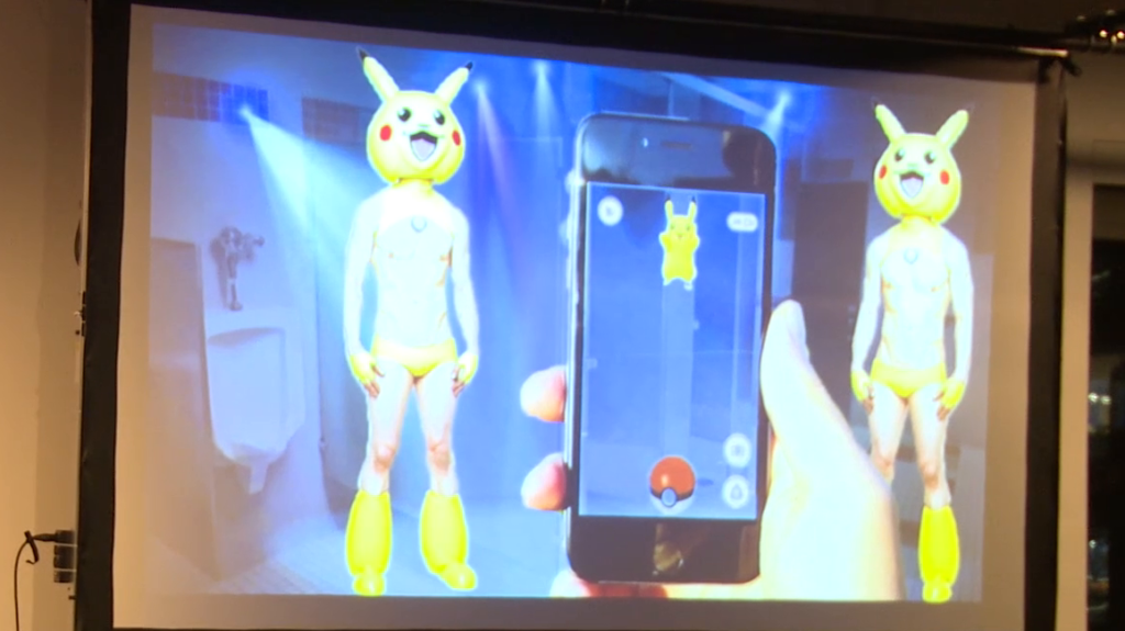 The bathroom again, this time superimposed with men in underwear and Pikachu masks, and a hand holding a cell phone playing Pokemon Go