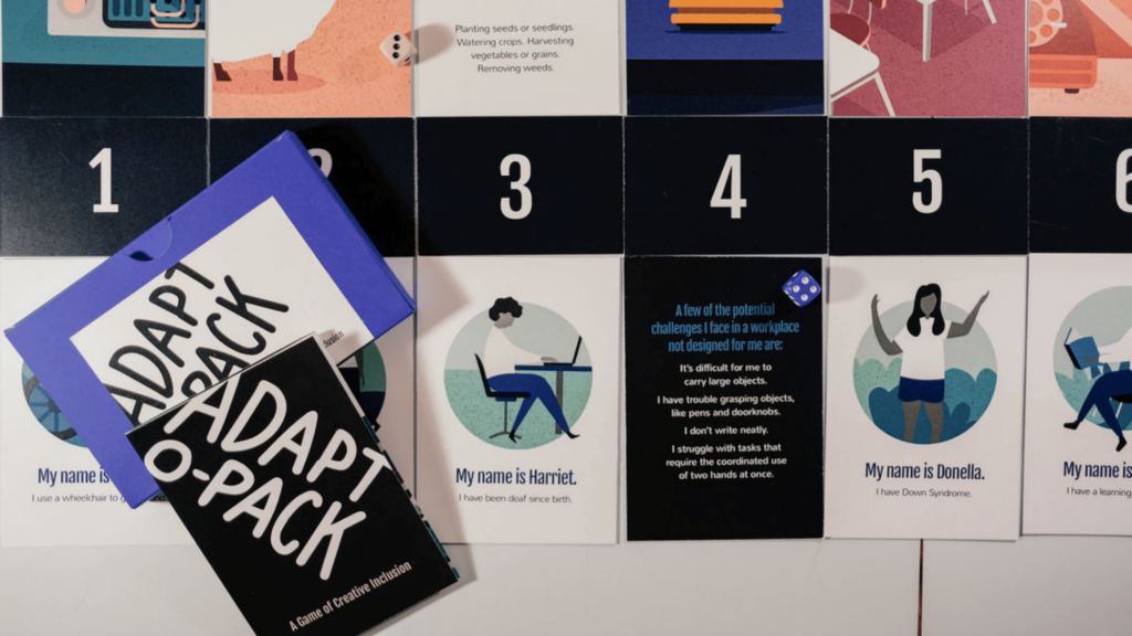 Adapt-O-Pack cards laid out on a surface, showing illustrations of various characters and their disabilities, plus obverse sides with text explaining the kinds of difficulties they might face in the workplace.
